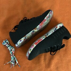 Women’s floral, NoBull workout shoes. color, black daisy. Worn twice.